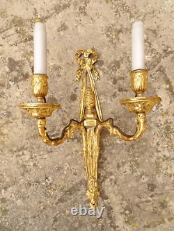 Pair of Louis XVI period wall sconces. Gilt bronze. Sconces. Late 18th century, early 19th century.