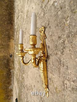 Pair of Louis XVI period wall sconces. Gilt bronze. Sconces. Late 18th century, early 19th century.