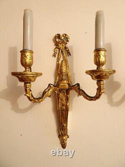 Pair of Louis XVI period wall sconces. Gilt bronze. Sconces. Late 18th century, early 19th century.