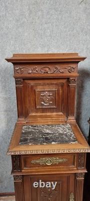 Pair of Renaissance style nightstands in carved walnut, 19th century