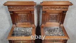 Pair of Renaissance style nightstands in carved walnut, 19th century