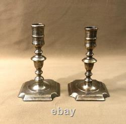 Pair of antique candlesticks from the Louis XIII period in bronze 17th century