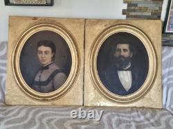 Pair of antique oil paintings, portrait of a distinguished couple, signed, 19th century.