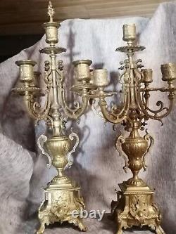 Pair of brass candelabra with five lights. Late 19th century. 52 cm