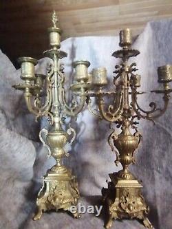 Pair of brass candelabra with five lights. Late 19th century. 52 cm