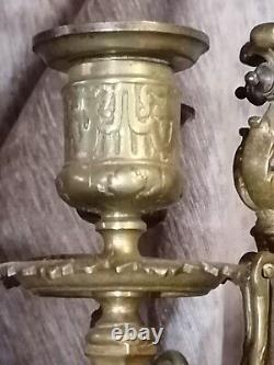 Pair of brass candelabra with five lights. Late 19th century. 52 cm