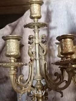 Pair of brass candelabra with five lights. Late 19th century. 52 cm