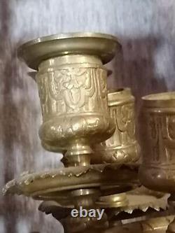 Pair of brass candelabra with five lights. Late 19th century. 52 cm