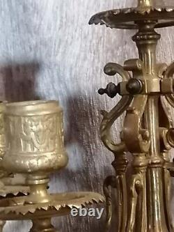 Pair of brass candelabra with five lights. Late 19th century. 52 cm