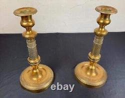 Pair of candlesticks Restoration period, Guilloché bronze, 19th century