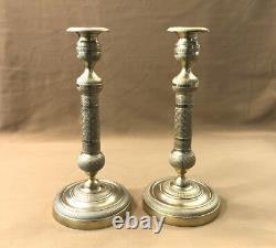 Pair of candlesticks / torch holders from the EMPIRE RESTORATION period in 19th century bronze