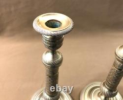 Pair of candlesticks / torch holders from the EMPIRE RESTORATION period in 19th century bronze