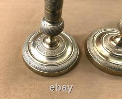 Pair of candlesticks / torch holders from the EMPIRE RESTORATION period in 19th century bronze