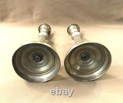 Pair of candlesticks / torch holders from the EMPIRE RESTORATION period in 19th century bronze