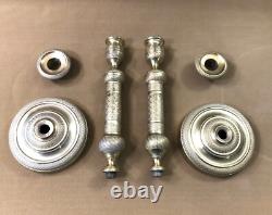 Pair of candlesticks / torch holders from the EMPIRE RESTORATION period in 19th century bronze