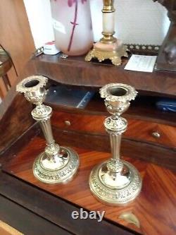 Pair of candlesticks/torch holders in bronze in the Louis XVI style, 19th century