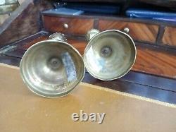 Pair of candlesticks/torch holders in bronze in the Louis XVI style, 19th century