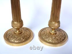 Pair of chiselled gilded bronze candle holders, Restoration period, early 19th century