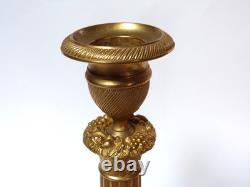 Pair of chiselled gilded bronze candle holders, Restoration period, early 19th century