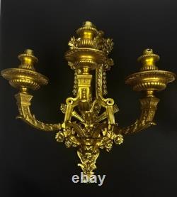 Pair of important gilded bronze wall sconces, Louis XVI style, 19th century