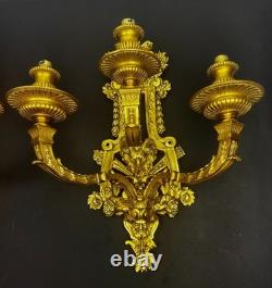 Pair of important gilded bronze wall sconces, Louis XVI style, 19th century