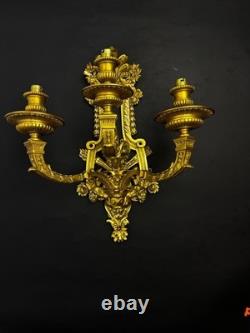 Pair of important gilded bronze wall sconces, Louis XVI style, 19th century Pair of important gilded bronze wall sconces, Louis XVI style, 19th century