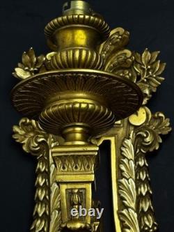 Pair of important gilded bronze wall sconces, Louis XVI style, 19th century Pair of important gilded bronze wall sconces, Louis XVI style, 19th century