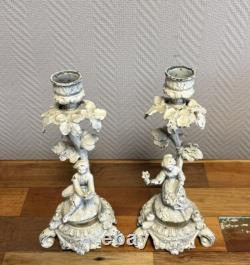 Pair of lacquered bronze candle holders, 19th century, circa 1880