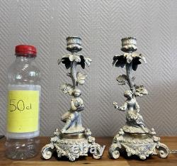 Pair of lacquered bronze candle holders, 19th century, circa 1880