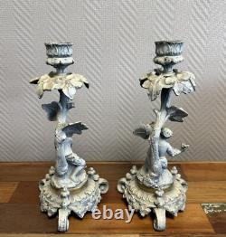 Pair of lacquered bronze candle holders, 19th century, circa 1880