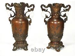 Pair of small patinated bronze vases from the late 19th century