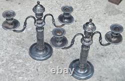 Pair of three-light candle holders, silver-plated, 19th century.