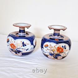 Pair of very beautiful porcelain vases signed Tinet in Paris, 19th century.