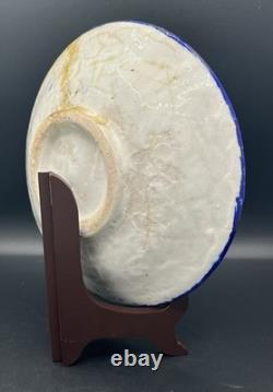 Persian faience dish with polychrome bird and flower decoration, Qajar period, 19th century