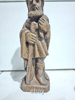 Polychrome wooden sculpture. Saint Joseph holding his cane. 19th century.