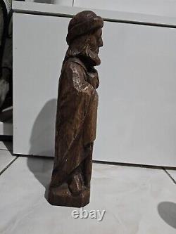 Polychrome wooden sculpture. Saint Joseph holding his cane. 19th century.