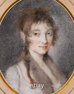 Portrait of a young woman or girl in oval pastel from the Restoration Empire era of the 19th century