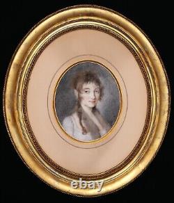 Portrait of a young woman or girl in oval pastel from the Restoration Empire era of the 19th century