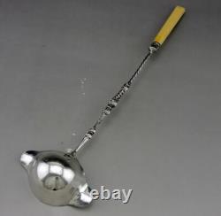 Punch ladle or cream in sterling silver and bone, 19th century