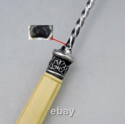 Punch ladle or cream in sterling silver and bone, 19th century