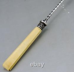 Punch ladle or cream in sterling silver and bone, 19th century Punch ladle or cream in sterling silver and bone, 19th century