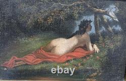 Rare oil nude reclining in a forest, looking at a pair of birds, 19th century
