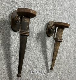 Rare pair of medieval-style torch sconces in 19th century iron