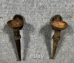 Rare pair of medieval-style torch sconces in 19th century iron