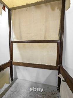 Renaissance-style walnut canopy bed from the 19th century