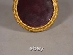 Round Louis XVI picture frame in chiselled and gilded bronze, late 19th century