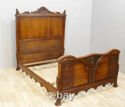 Sculpted Walnut Bed With Mascarons And Leaves Of Acanthe 140190 Era Xixth