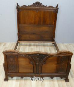 Sculpted Walnut Bed With Mascarons And Leaves Of Acanthe 140190 Era Xixth