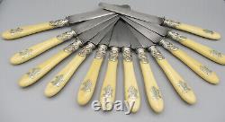 Set of twelve armorial knives in bone and silverware, 19th century, VEYRAT Paris.