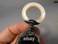 Solid silver and mother-of-pearl baby rattle, 19th century